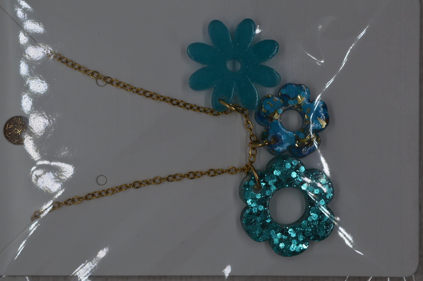 Les colliers à pendentifs interchangeables